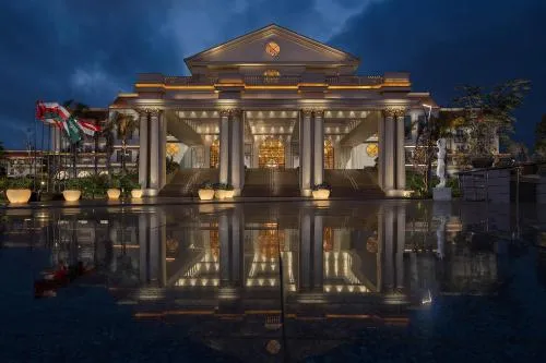 Nighttime exterior of a luxury hotel in Cairo with city lights